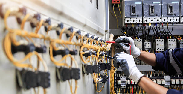 Professional Electrician technician working in Fair Plain, MI
